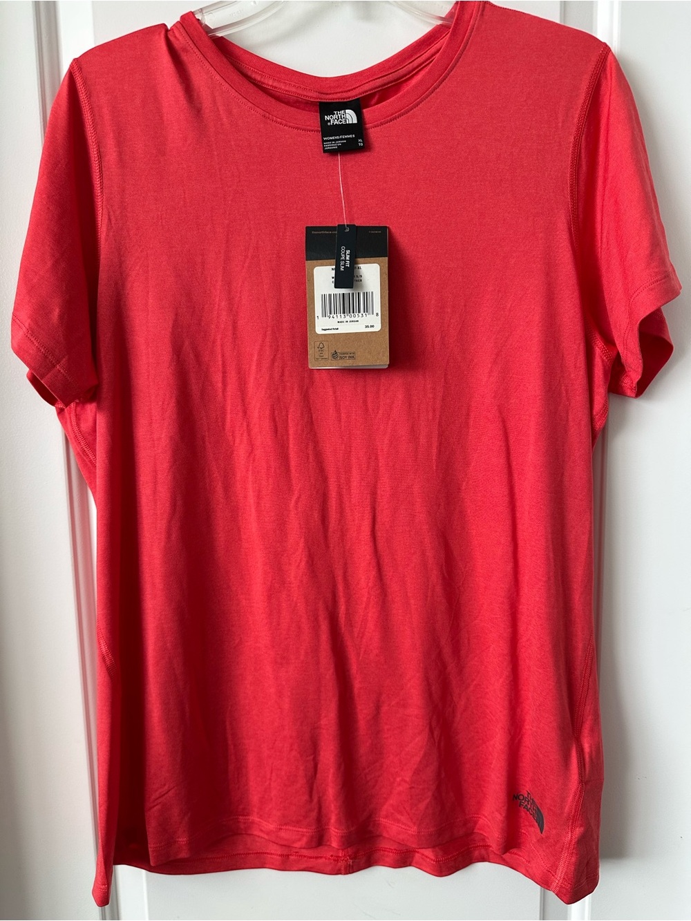 The North Face woman’s Short-Sleeve Crew T-Shirt in Coral